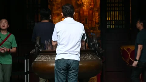 Offering prayers Stock Footage 234798427