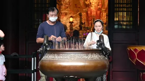 Offering prayers Stock Footage 234798429