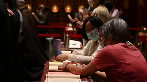 Offering prayers Stock Footage 240376454