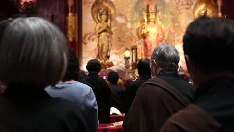 Offering prayers Stock Footage 240376483