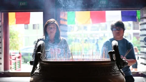 Offering prayers Stock Footage 240376493