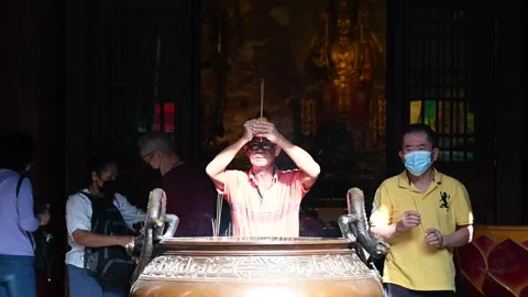 Offering prayers Stock Footage 240381823