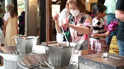 Offering prayers Stock Footage 240384602