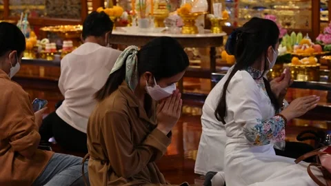 Offering prayers Stock Footage 240385643