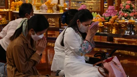 Offering prayers Stock Footage 240385644