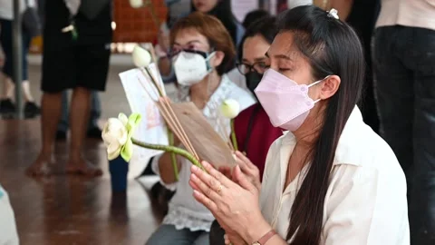 Offering prayers Video stock 240385813