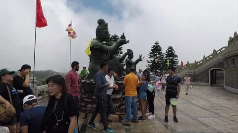 The Offering of the Six Devas, Tian Tan Buddha, Lantau Island, Hong Kong Stock Footage 153169213
