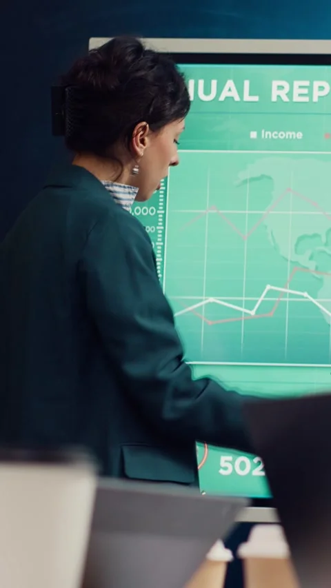 Office administrator presenting data reports and funding on interactive board Stock Footage 272272227