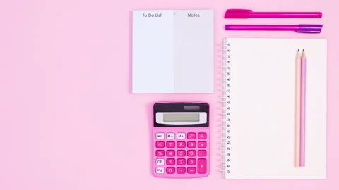 Office and school tools appear with unwrapping blank paper for text. Stop motion Stock Footage 158859664