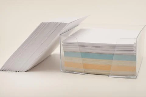An office block of paper for notes. The paper is on the table. Stock Photos
