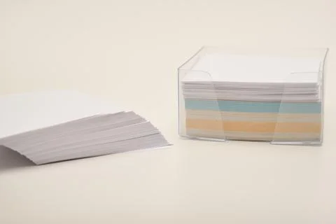 An office block of paper for notes. The paper is on the table. Stock Photos