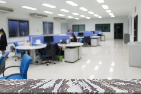 Office blured background on wook table Stock Photos