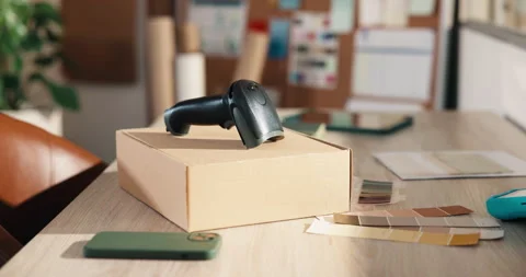 Office, box and scanner at startup for ecommerce, logistics and color palette Stock Footage 346290457