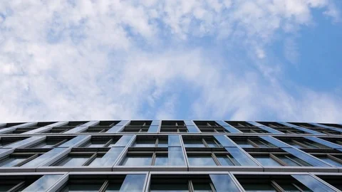 Office building on blue sky white clouds timelapse 動画素材 80608687