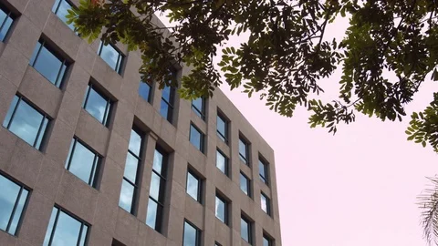 Office Building Cloudy Pan Left Stock Footage