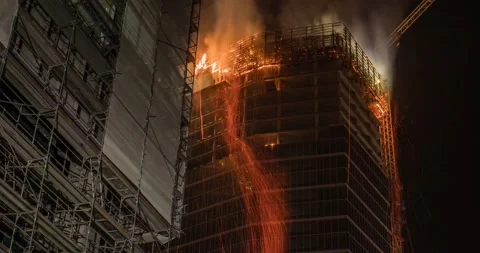 Office building on fire at night time lapse Stock Footage 142512284