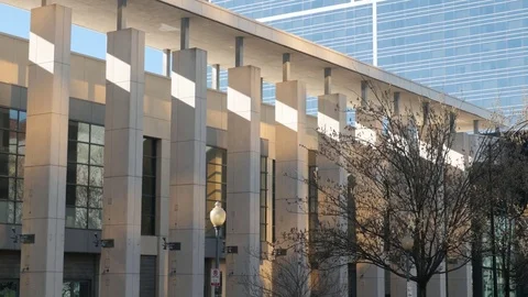 Office Building with Light Rays in City Stock Footage 73869269