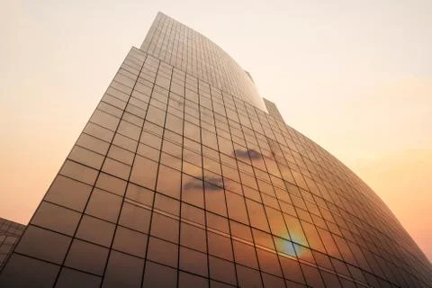 Office building with reflection of sunset Stock Photos