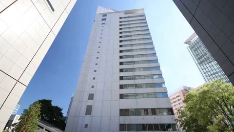Office building stands alone in Tokyo. Dolly move. Stock Footage 220098965