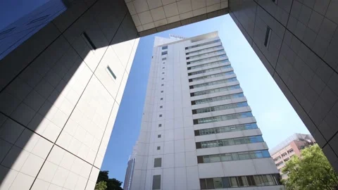 Office building stands alone in Tokyo. Dolly move. Stock Footage 220099015