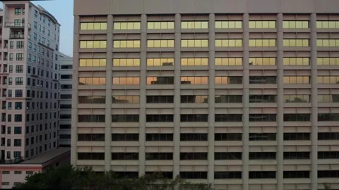 Office Building with sunlight relection in the windows Stock Footage 250500734