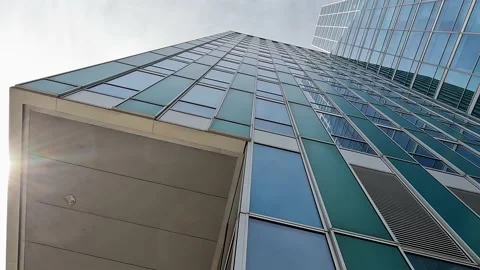 Office building under to top view outside on a cloudy day, in Almere Netherlands Video stock 201437450