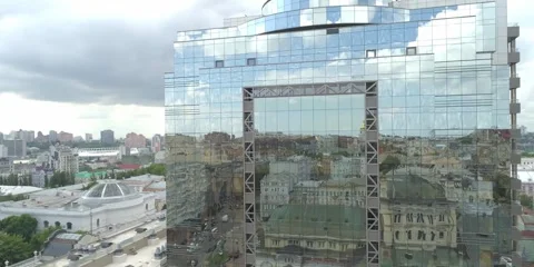 Office building with window glasses reflect city landscape Stock Footage 273614811
