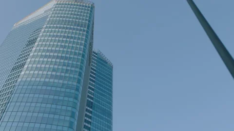 Office building windows and bottom view of skyscraper Stockbeeldmateriaal 239227724