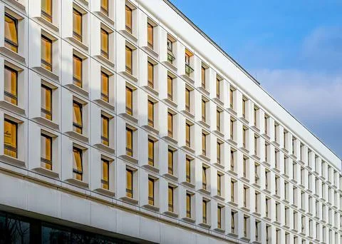 Office building windows background. Rectangular windows texture on a modern b 스톡 사진