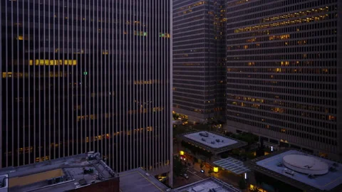 Office Building Windows Lighting Up in San Francisco - Day Night Timelapse Vídeos de archivo 183994478