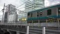 Office Buildings And Commuter Blue Line Train In Akinabara HD HD Footage