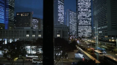 Office buildings from elevator at dusk Vídeo Stock 99890162