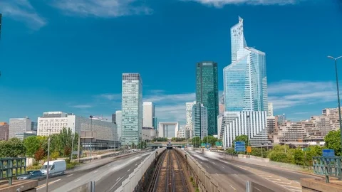 Office buildings in modern part of Paris - La Defense timelapse. Paris, France Stock Footage