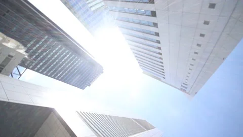 Office buildings in Tokyo. Looking up. Camera rotation. Stock Footage 220098558
