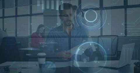 In office, business professionals processing digital data with image overlay Stock Photos