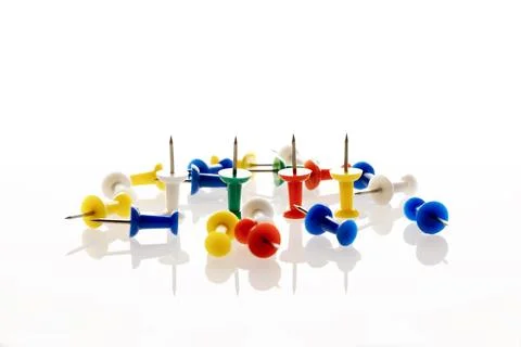 Office buttons for attaching documents to the wall. Stock Photos