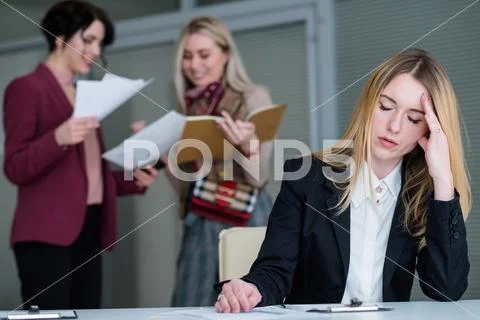Office buzz woman headache noisy workspace Stock Photos