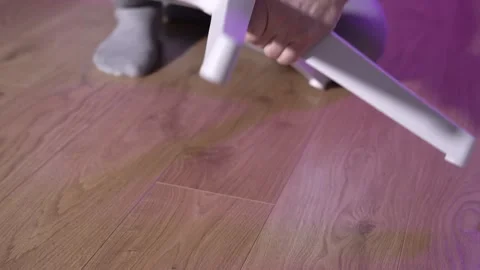 Office chair assembly process at home. Male hands connecting a plastic chair Stock Footage 327910023