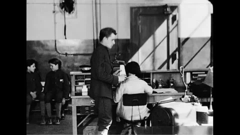 Office Clerk Boy Distributes Documents To Female Secretaries Working Vídeo Stock 156515152