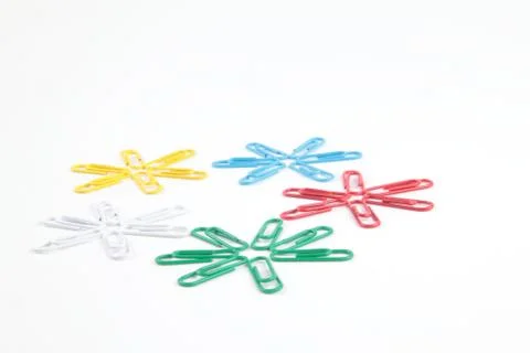 Office - Colored staples isolated Stock Photos