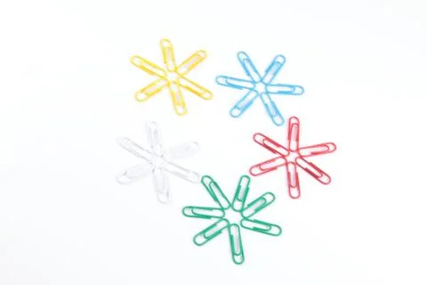 Office - Colored staples isolated on white Stock Photos
