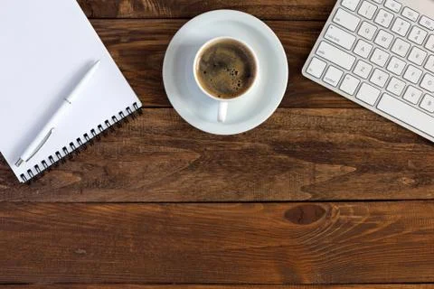 Office Composition with Electronics Stationery and Coffee on Hardwood Stock Photos
