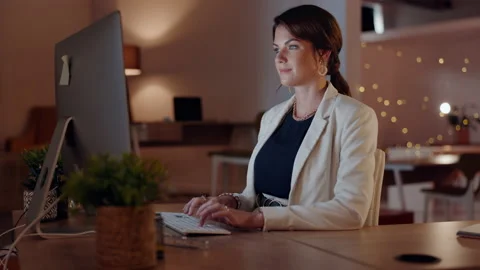 Office, computer and face of happy woman planning at night in career mindset or Stock Footage 237014607