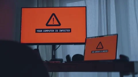 Office computers affected by malware or virus display warning message in red Stock Footage 342512263
