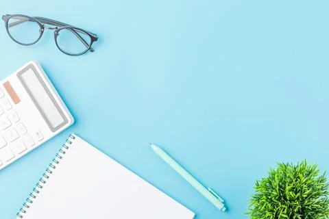 Office concept with calculator and notepad. Stock Photos