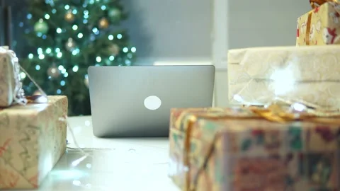 Office desk at christmas.empty workplace during the holiday.boke christmas tree 스톡 동영상 164385469