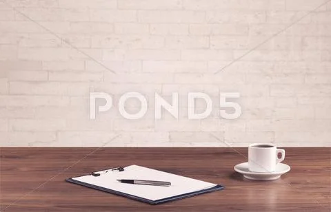Office desk closeup with white brick wall Stock Photos