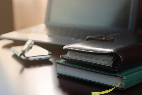 Office desk with a computer and a telephone diary 스톡 사진