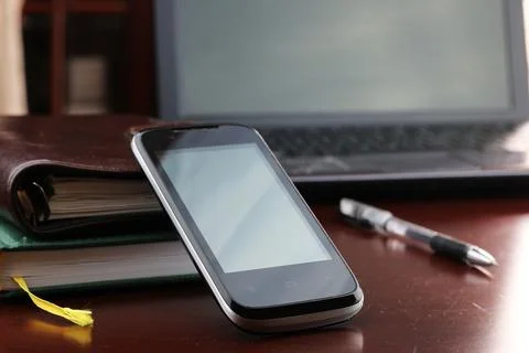 Office desk with a computer and a telephone diary 스톡 사진
