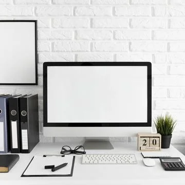 Office desk with computer screen keyboard Stock Photos